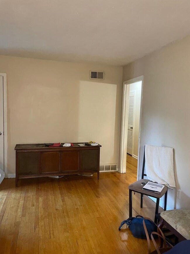 Miscellaneous room with light hardwood / wood-styl