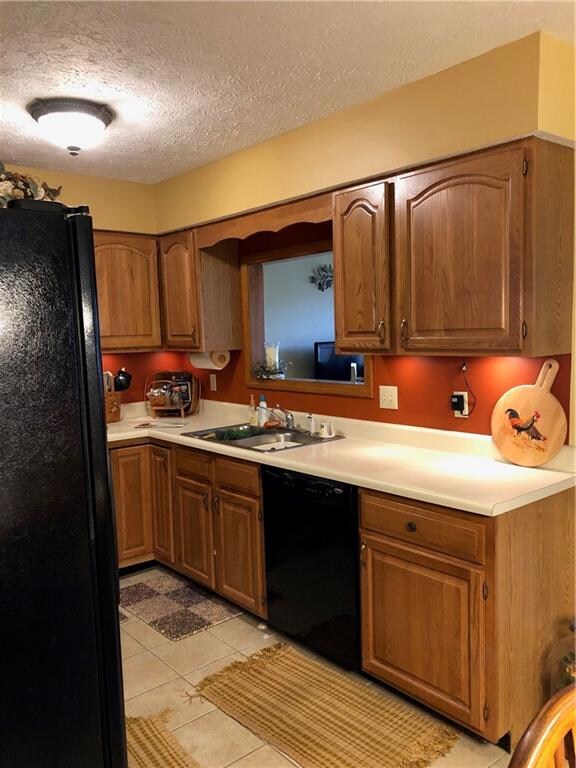 Kitchen with opening into Family Room