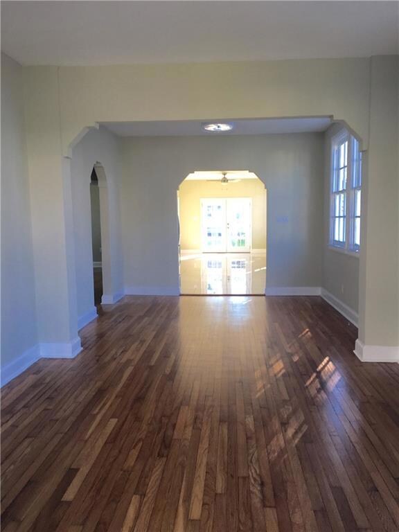 View of living room and dining looking through kit
