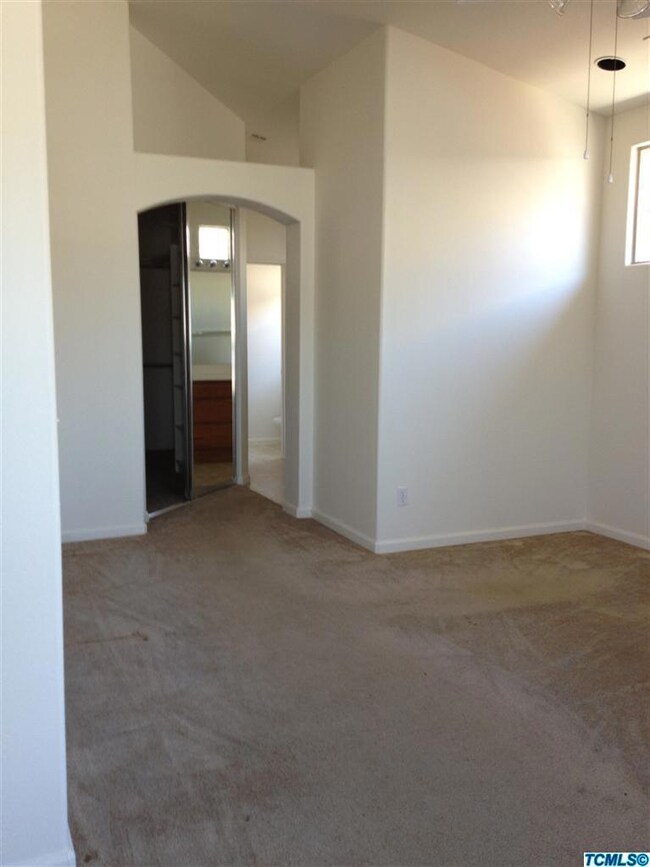 Master bedroom view to large walkin clos