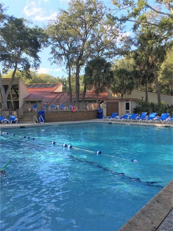 Huge pool and deck along with large kiddie pool an