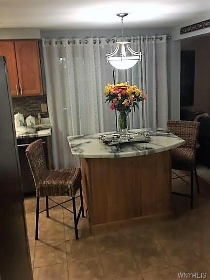 Island, sliders behind curtains lead you to beauti