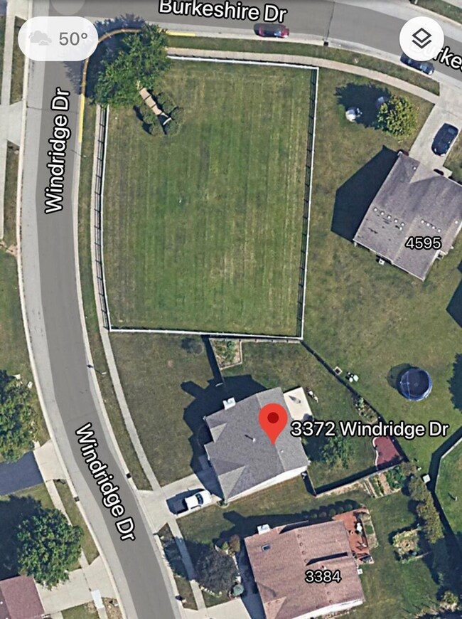 aerial view of house and park