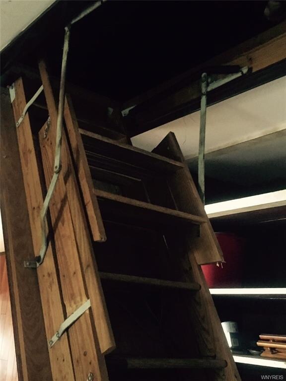 One of two pull down stairs to access attic.