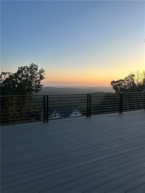 View of deck at dusk
