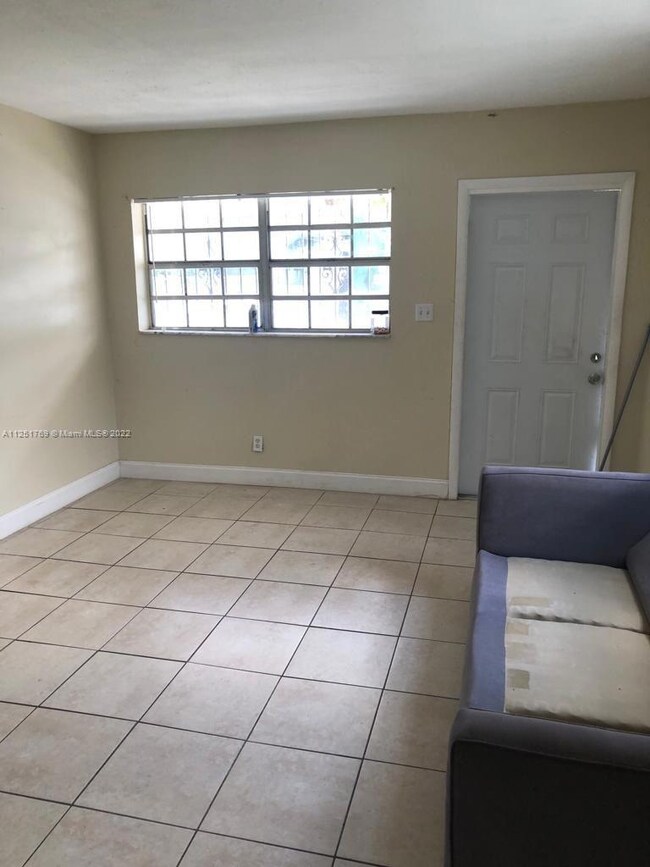 990 Phippen Waiters Rd unit 2, Dania, FL 33004 - photo 3