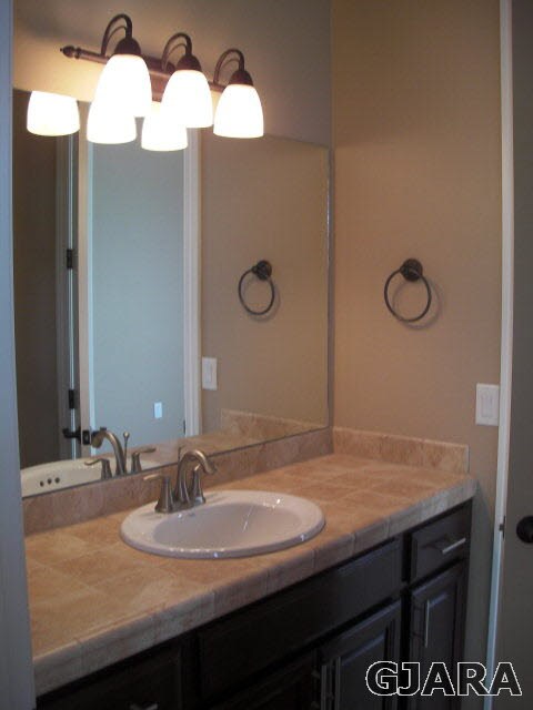 Pictures are of a similar floor plan and finishes.