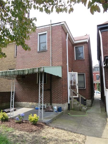 Exterior rear and covered rear porch