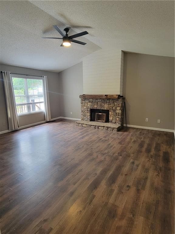 Unfurnished living room featuring ceiling fan, lof