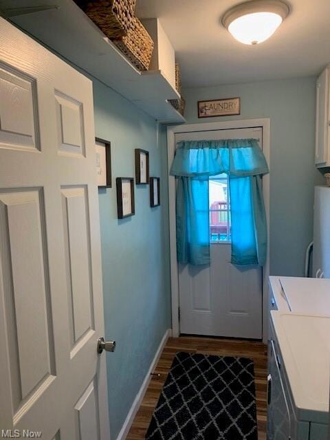 Doorway with hardwood flooring