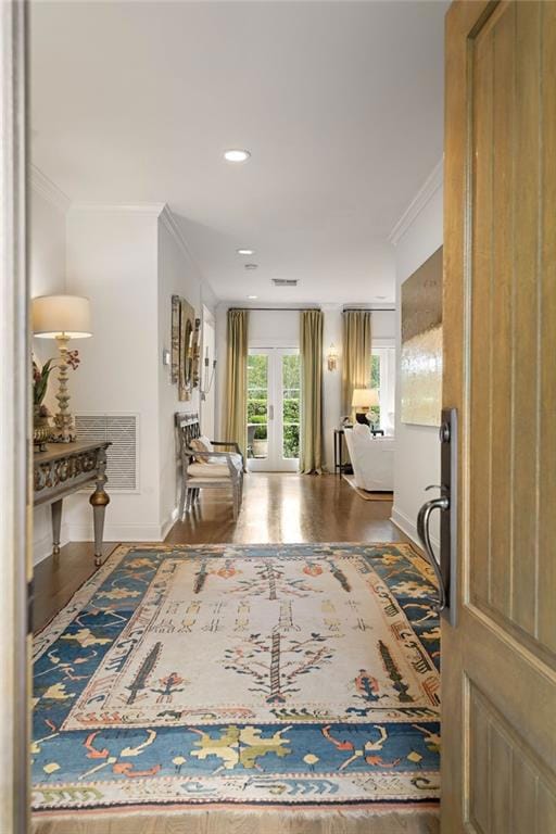Enter into a wide center hallway.