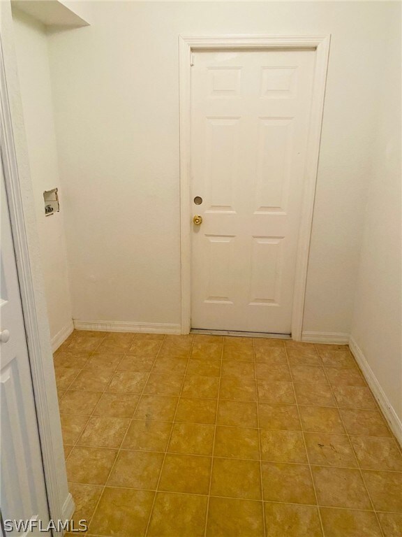 Laundry room with room