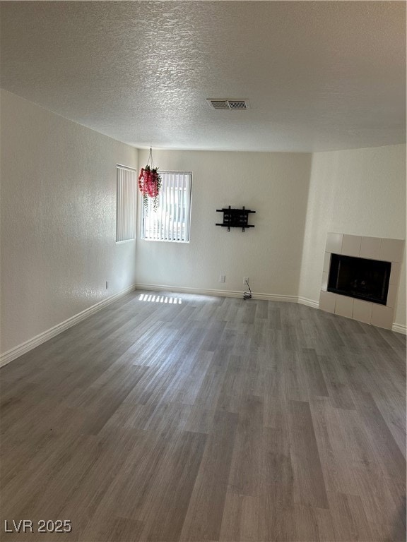 Unfurnished living room with wood finished floors,