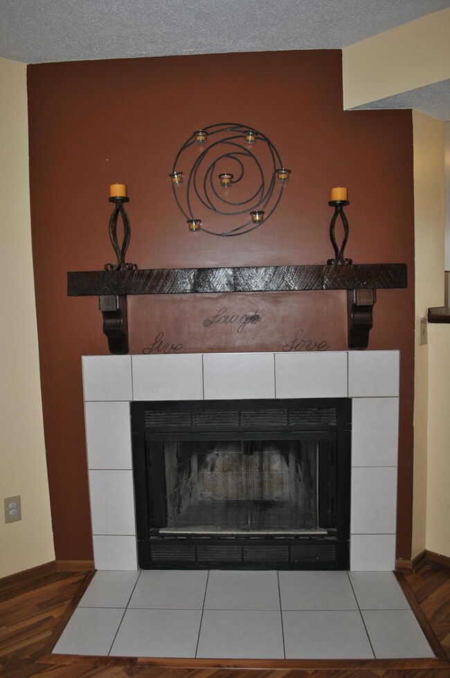 WOOD BURNING FIREPLACE & MANTLE