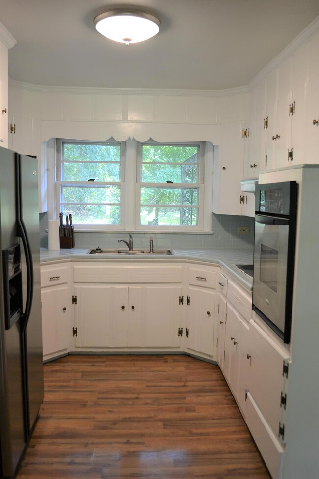 Updated kitchen with pantry and stainless appliances 