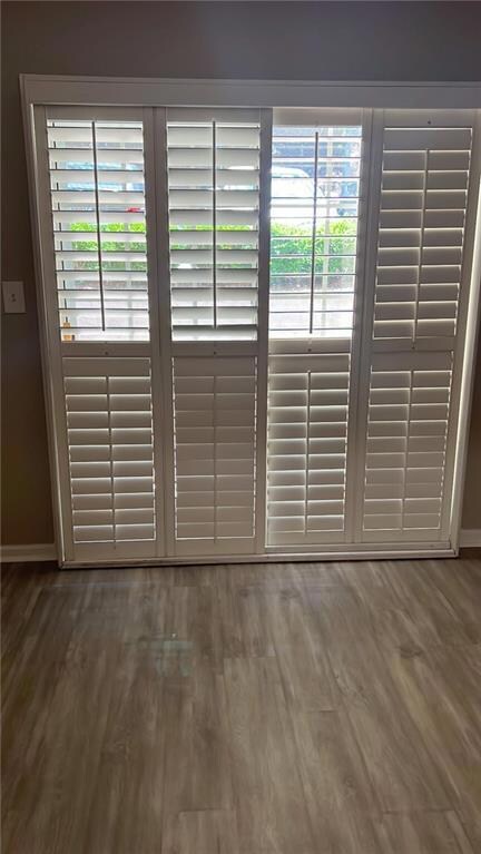 Detailed view of wood finished floors and baseboards