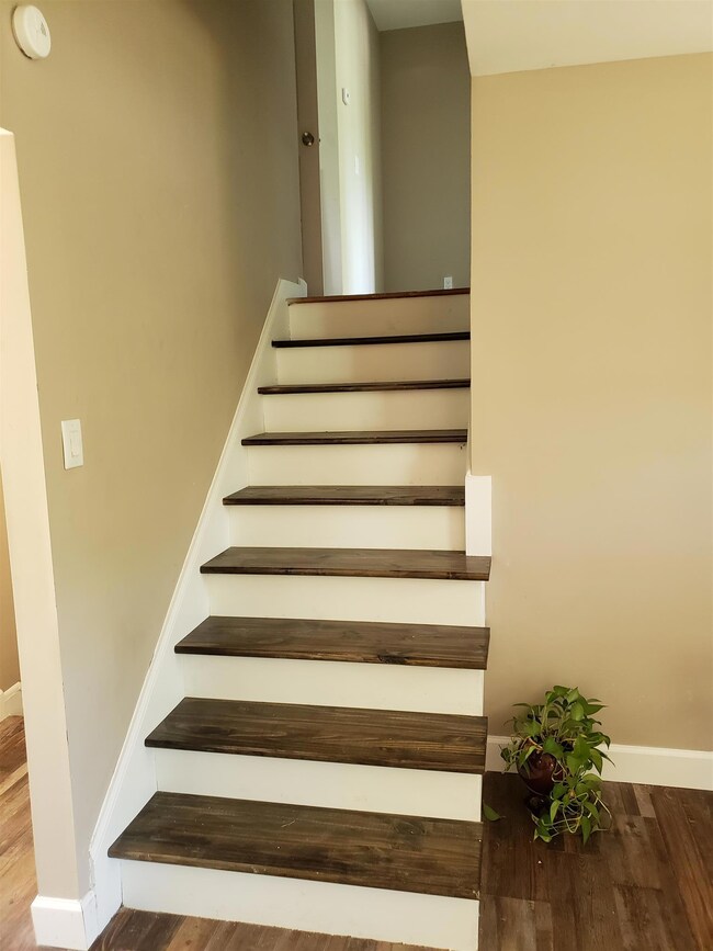 Beautiful new Stairs Leading to New Maser Suite W/Full Bath & Walk-in Closet