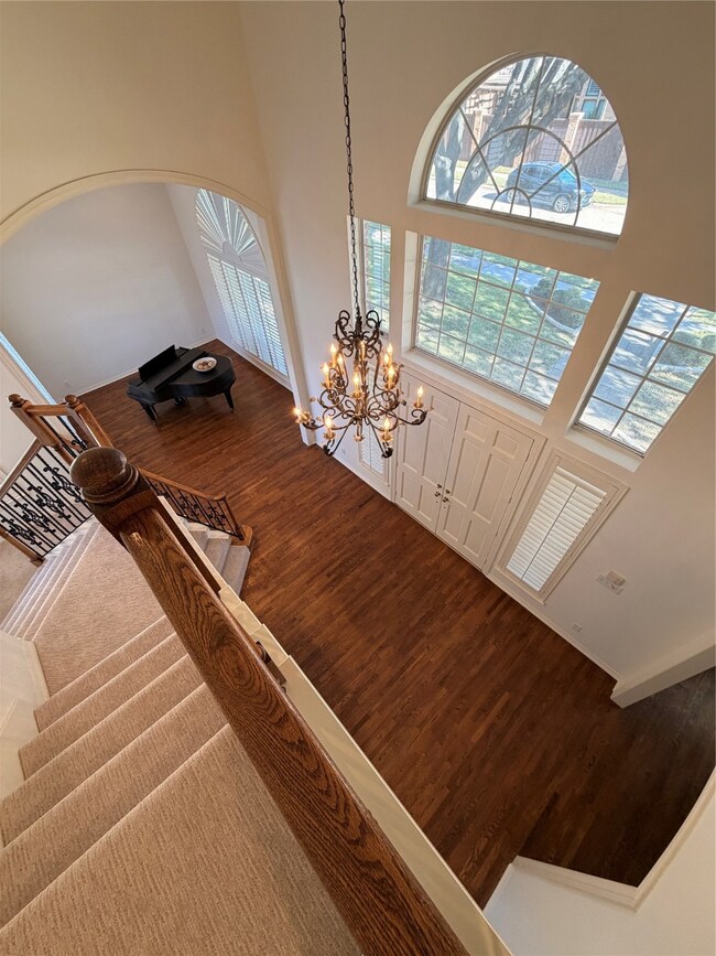 View from your upstairs down to your amazing entry area...