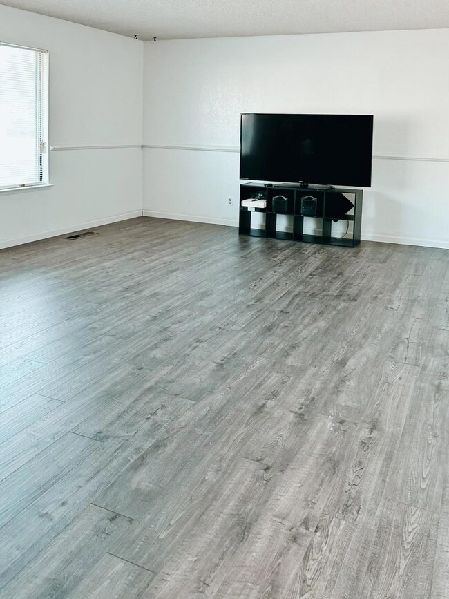 Formal living room off the front entrance, which c