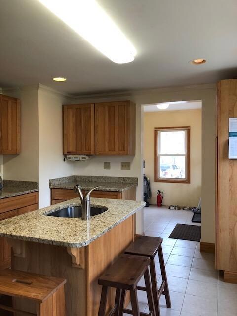 Large mudroom off kitchen