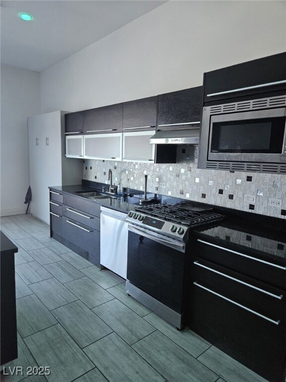 Kitchen featuring appliances with stainless steel