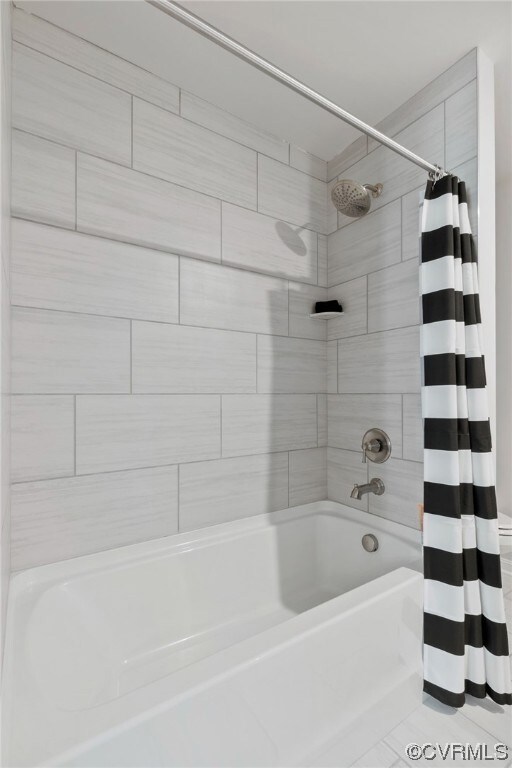 Bathroom with shower / tub combo