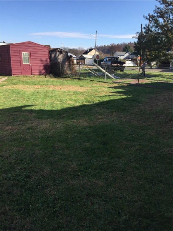 Nice yard with lawn shed.