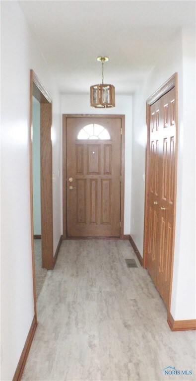 Foyer Opens To The Living Room and Kitchen Areas.