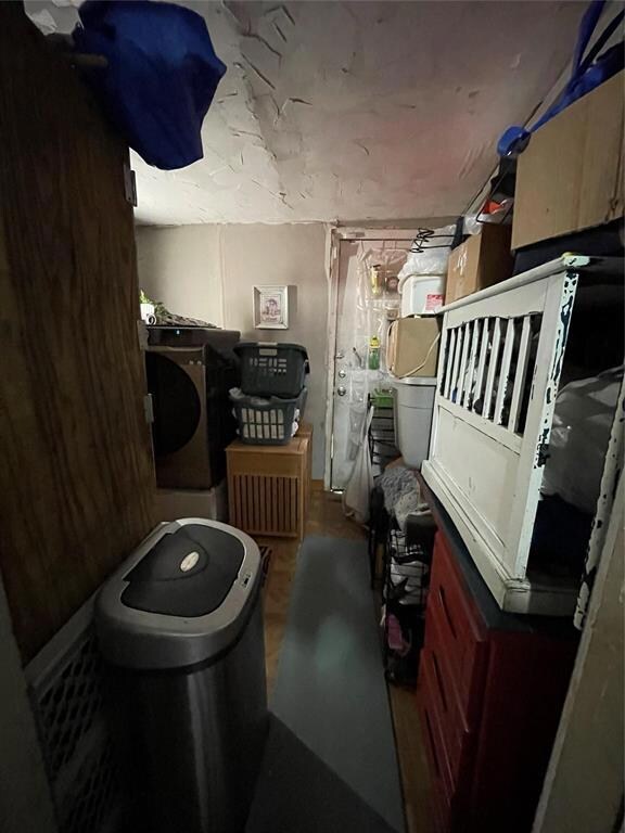 Storage room featuring washer / dryer