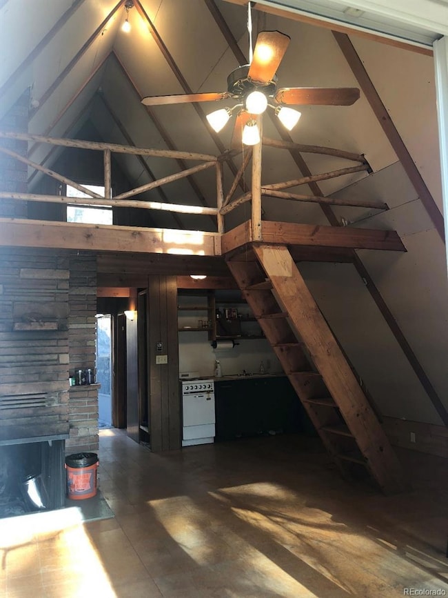 Great room into Kitchen and up to loft