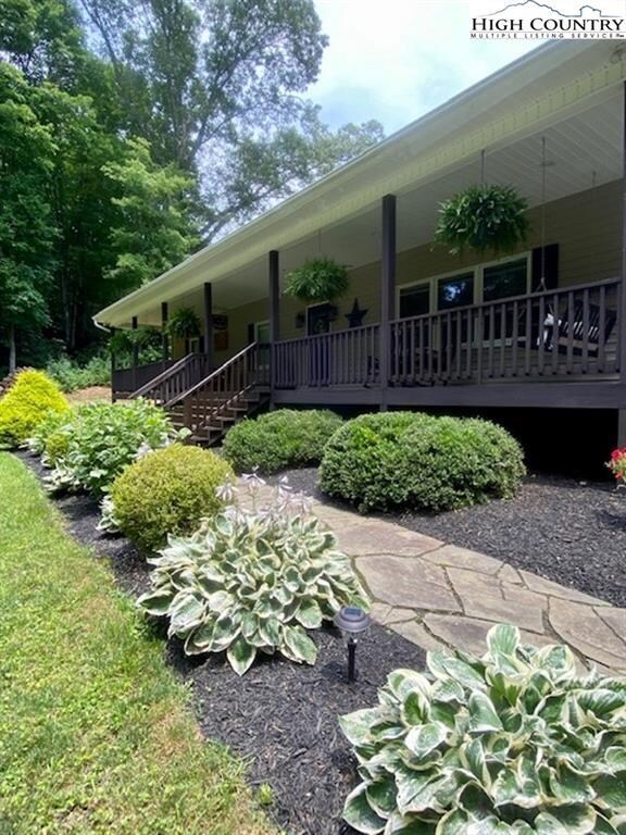 Nicely landscaped walkway area that leads to the h