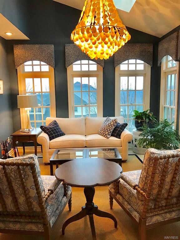 Beautiful sunroom with wall of windows, with view 