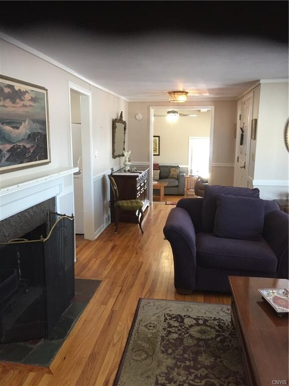 living room w/ woodburning fireplace