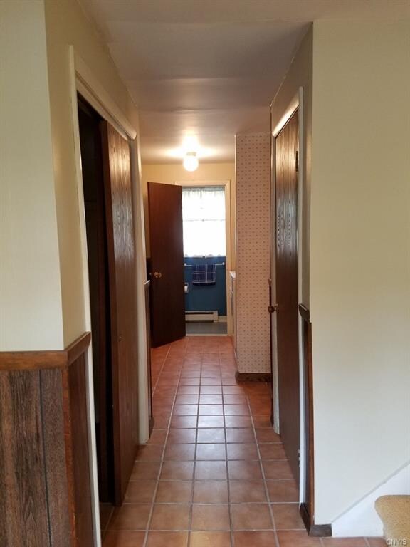 Looking toward the laundry room and half bath from