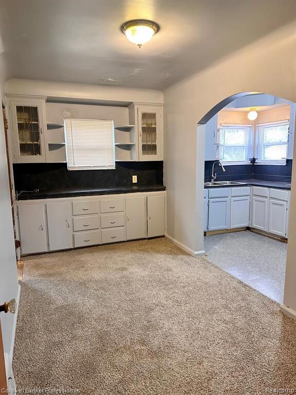 Dining with beautiful built-in cabinetry...