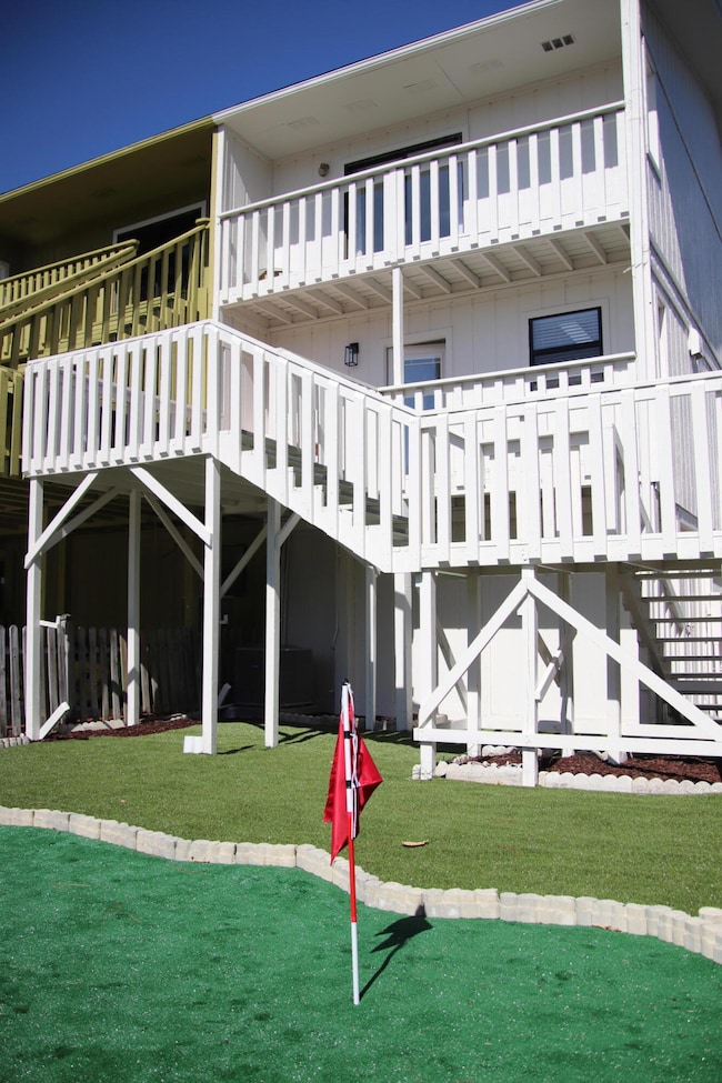 Fenced Backyard w/putting green