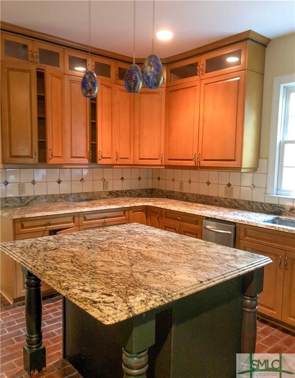 LARGE KITCHEN WITH PLENTY OF STORAGE AND WORK SURF