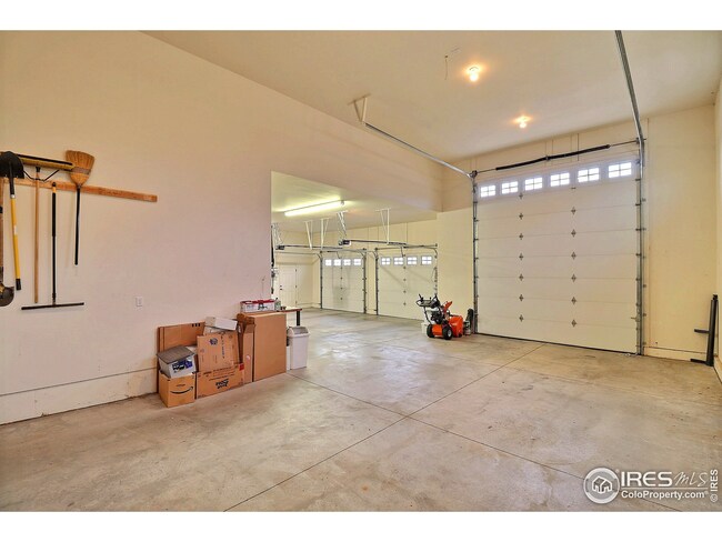 with 3-Car Insulated Garage w 14' Overhead Door, 32x30 3rd Bay