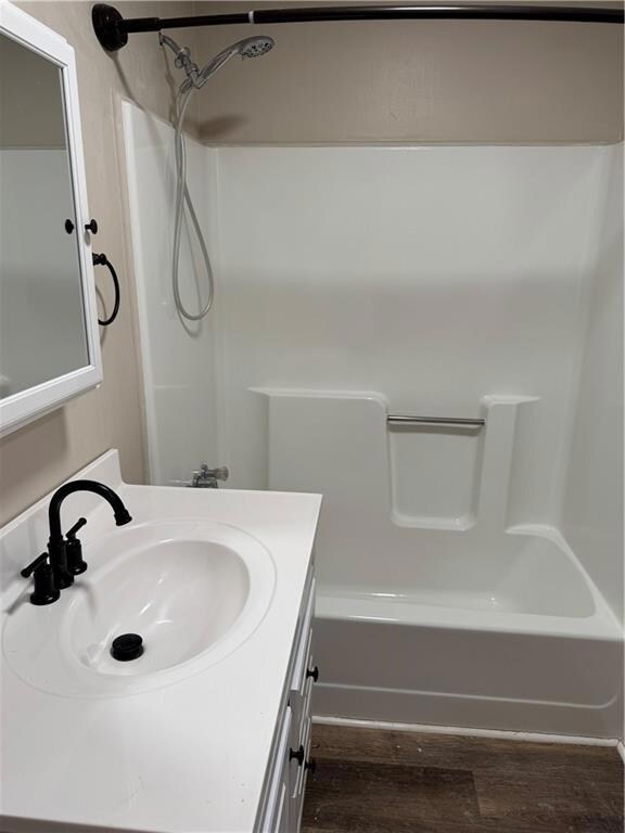 Bathroom featuring hardwood / wood-style flooring,