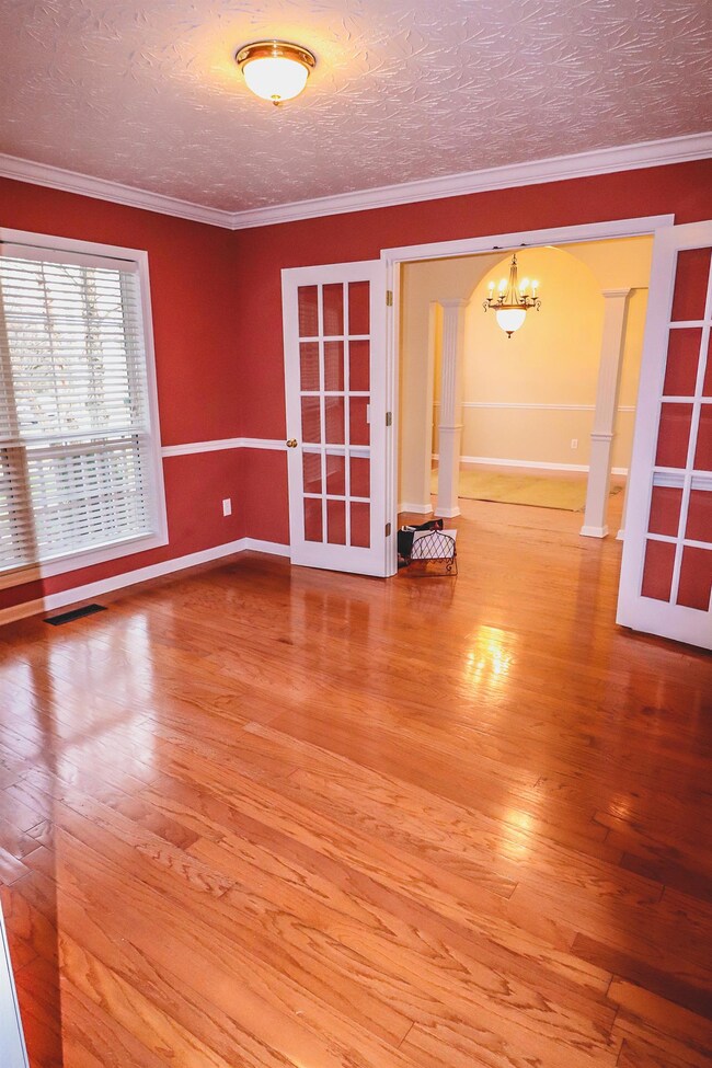 Spacious office with adorable french doors.  Could be a reading room or hobby room as well.  Lots of options here!  