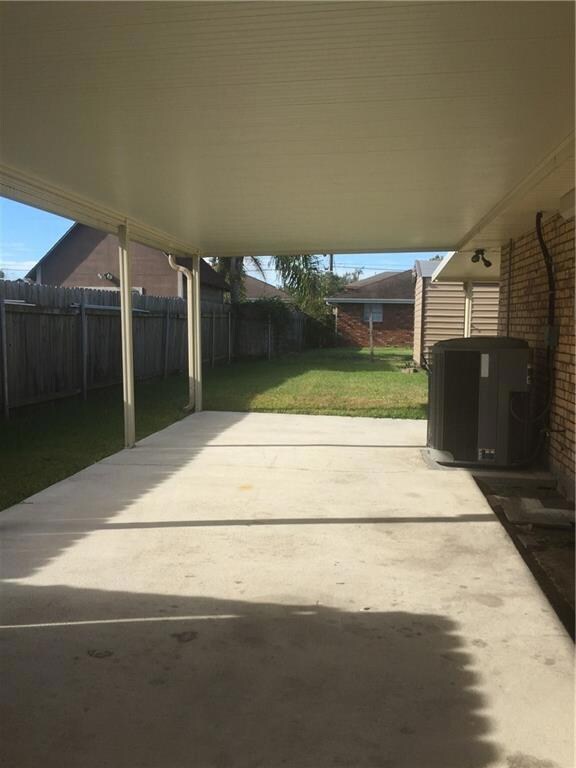 Two covered areas Carport & back yard patio for we