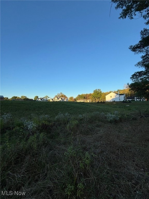 View of undeveloped land featuring rural landscape
