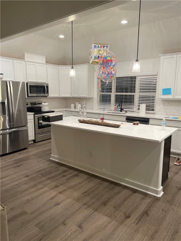 Kitchen featuring appliances with stainless steel