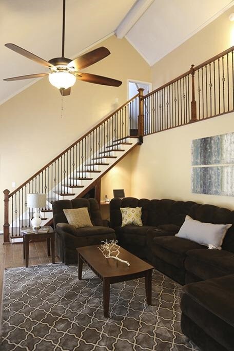 Phenomenal living room with a high vaulted ceiling