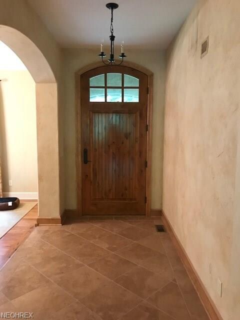 Foyer entrance leading to the formal dining room a