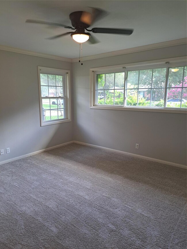 One of three bedrooms all freshly painted with new