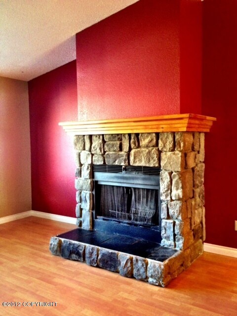 Fireplace with stone accents