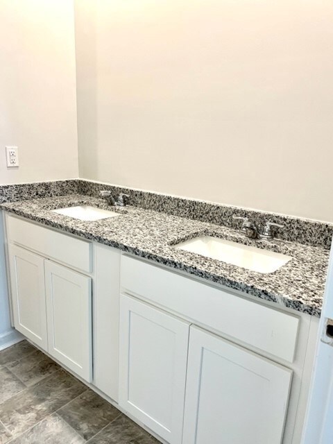 Double vanity in Primary bathroom! They will install the mirror very soon.