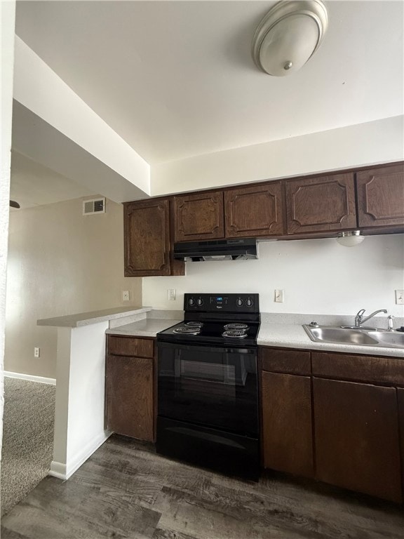 Kitchen with electric range, under cabinet range h