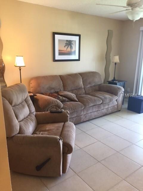 Large living room with tile floors